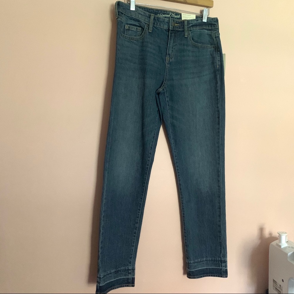 Mid Rise Boyfriend medium wash tapered leg jeans